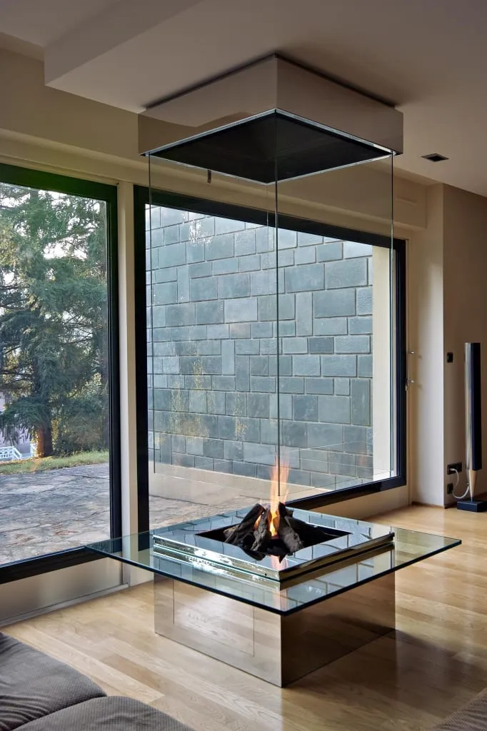 central fireplace with glass