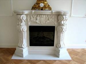 Clock above the fireplace insert