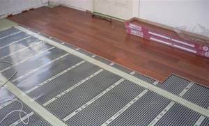 Electric heated floor in a wooden house 9