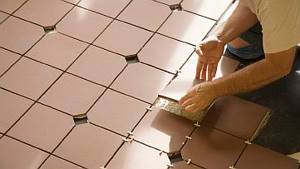 Photo - Fixing tiles on the floor surface