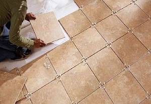 Photo - Laying ceramic tiles on a warm floor