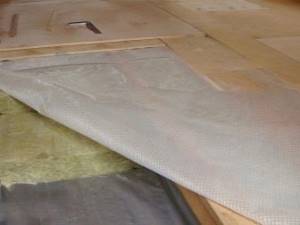 Waterproofing under floor insulation