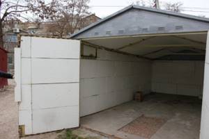 Как обшить металлический гараж снаружи