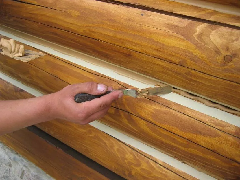 how to properly insulate the walls of a wooden house from the inside