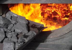 How to light a stove with coal