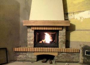 How to make the transition from a fireplace chimney to a larger diameter ceramic chimney