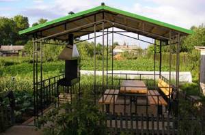 A summer kitchen gazebo made of metal is usually designed in the form of a light canopy based on profile pipes