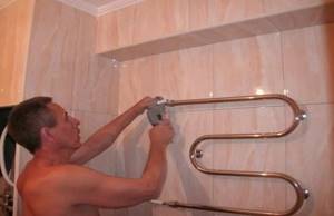 Installation of heated towel rail