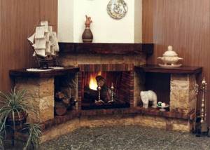 Installation of a corner fireplace can be done after designing the house
