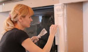 Decorating the fireplace with stucco