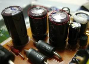 Why do capacitors in the power supply swell?