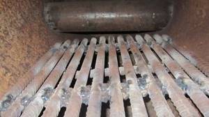 Shown is a homemade grate made from rebar.