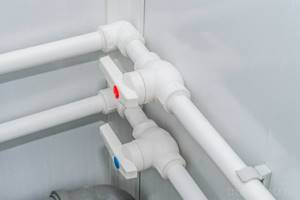 Polypropylene pipes and fittings on the wall