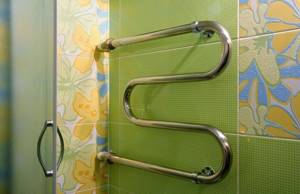 Heated towel rail in the bathroom