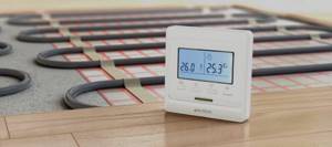 The operation of the heated floor is regulated using a thermostat, which turns off the system when a certain temperature is reached