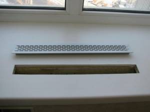 Grille in the countertop above the radiator: types and installation, characteristics