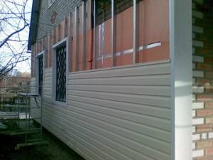 The siding looks great and also hides the insulation layer