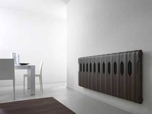 A stylish version of a metal screen for rooms in minimalist and high-tech styles