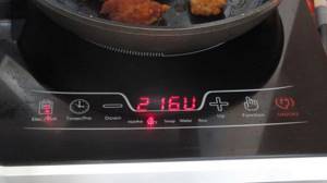 Test of the tabletop induction cooker KITFORTKT-102 - monitoring energy consumption