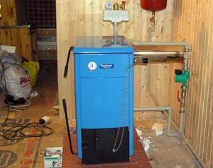 solid fuel boiler for heating a cottage