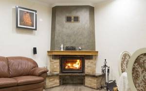 Corner fireplace saves space in the room