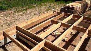 laying a subfloor in a wooden house