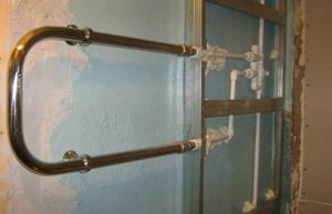 Installation of a heated towel rail