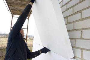 Insulation of a brick wall from the outside with polystyrene foam