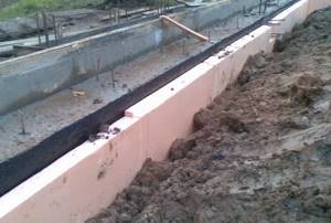 Insulation with permanent formwork