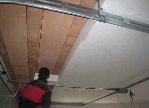 Insulating the basement ceiling with foam plastic from the inside