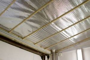 Insulating the ceiling in a house from the inside with foil penofol