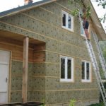 Insulation of house walls under siding