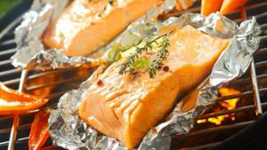 Which side of the foil should you wrap fish and meat when baking?
