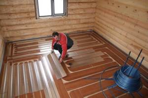 water heated floor in a wooden house