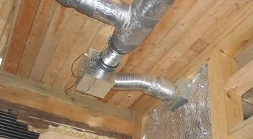 Air ducts for heating a house with a fireplace